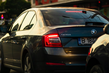 Car traffic at rush hour in downtown area of the city. Car pollution, traffic jam in the morning and...