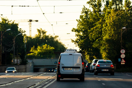 Car traffic at rush hour. Traffic jam, cars on the road at sunset in Bucharest, Romania, 2021のeditorial素材
