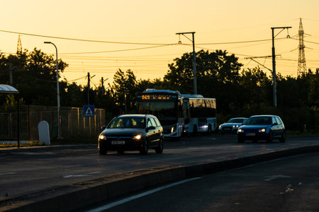 Car traffic at rush hour. Traffic jam, cars on the road at sunset in Bucharest, Romania, 2021