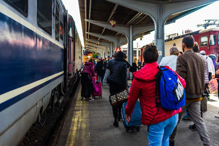 Train waiting at train platform at Bucharest North Railway Station (Gara de Nord Bucharest). Commuting by train in Europe, Romania, Bucharest 2021のeditorial素材