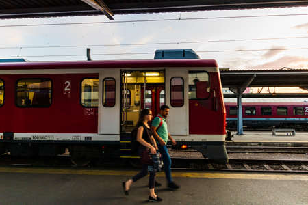 Train waiting at train platform at Bucharest North Railway Station (Gara de Nord Bucharest). Commuting by train in Europe, Romania, Bucharest 2021のeditorial素材