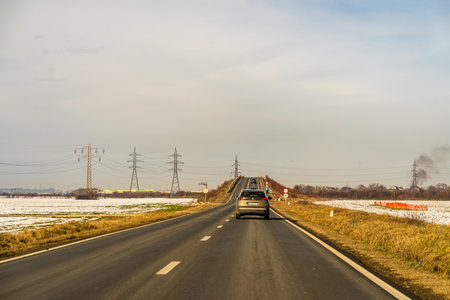 Road view through car windshield, cars on road in traffic in Bucharest, Romania, 2021のeditorial素材