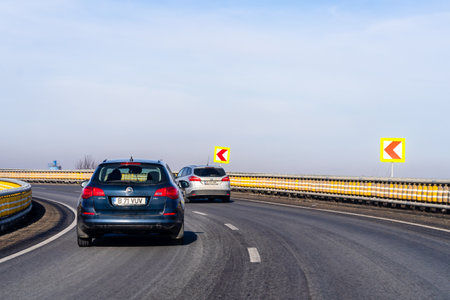Road view through car windshield, cars on road in traffic in Bucharest, Romania, 2021のeditorial素材