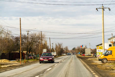 Road view through car windshield, cars on road in traffic in Bucharest, Romania, 2021のeditorial素材