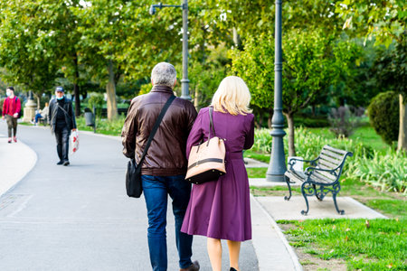 People moving, pedestrians walking in downtown district of Bucharest, Romania, 2021のeditorial素材
