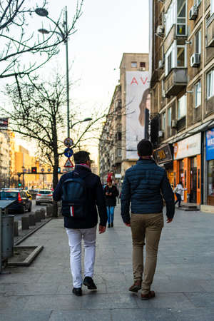 People moving, walking on the streets in downtown of Bucharest, Romania, 2021のeditorial素材