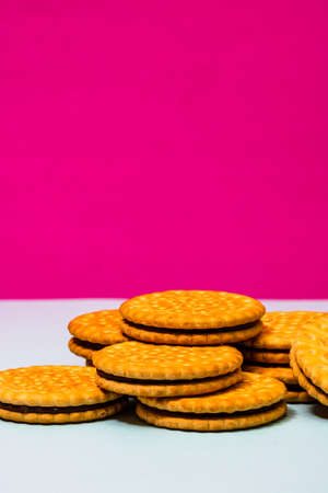 Round biscuits with chocolate cream, sandwich biscuits with chocolate filling isolated.の写真素材