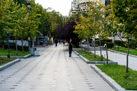 People moving, pedestrians walking in downtown district of Bucharest, Romania, 2021