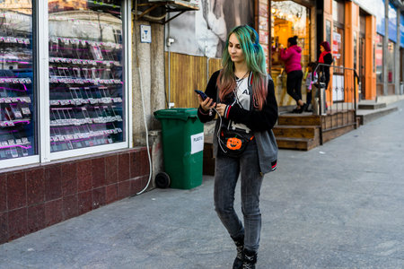 People moving, pedestrians walking in downtown district of Bucharest, Romania, 2021