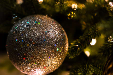 Christmas decorations against lights backgroundの写真素材