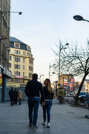 People moving, walking on the streets in downtown of Bucharest, Romania, 2021