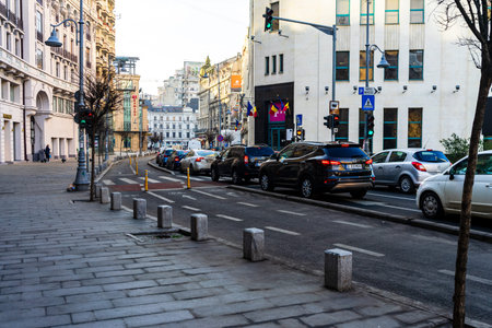 Car traffic at rush hour in downtown area of the city. Car pollution, traffic jam in the morning and...