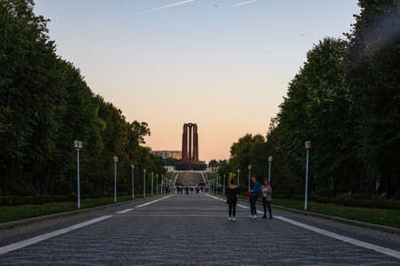 People walking on the main alley of Carol Park in Bucharest, Romania, 2021のeditorial素材