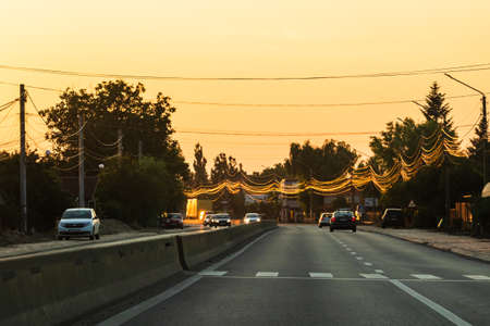 Car traffic at rush hour. Traffic jam, cars on the road at sunset in Bucharest, Romania, 2021のeditorial素材