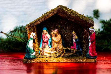 Colorful Nativity Scene with baby Jesus against Christmas backgroundの写真素材