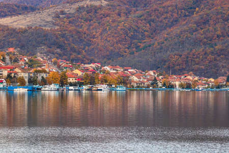 View of Danube river and Orsova city vegetation and buildings, waterfront view. Orsova, Romania, 2021のeditorial素材