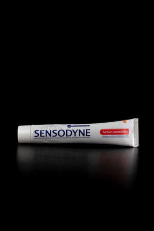 Sensodyne toothpaste tube on black background. Bucharest, Romania, 2021のeditorial素材