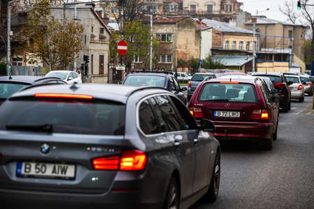 Car traffic at rush hour in downtown area. Bucharest, Romania, 2019.のeditorial素材