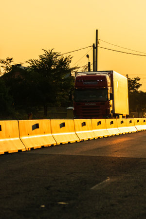Car traffic at rush hour. Traffic jam, cars on the road at sunset in Bucharest, Romania, 2021のeditorial素材