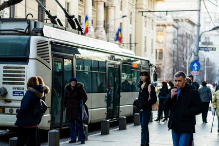 People walking or crossing the street in downtown Bucharest, Romania, 2021のeditorial素材
