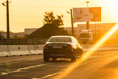 Car traffic at rush hour. Traffic jam, cars on the road at sunset in Bucharest, Romania, 2021のeditorial素材