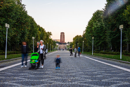 People walking on the main alley of Carol Park in Bucharest, Romania, 2021のeditorial素材