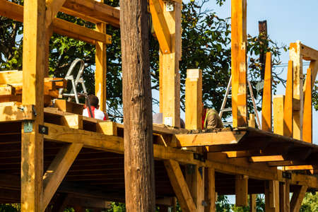 New construction, unfinished wooden house in a mountain area.のeditorial素材