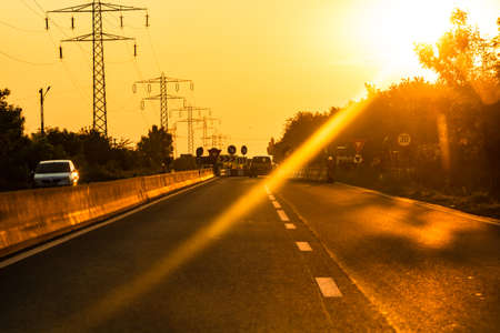 Car traffic at rush hour. Traffic jam, cars on the road at sunset in Bucharest, Romania, 2021のeditorial素材