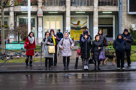People walking or crossing the street in downtown Bucharest, Romania, 2021のeditorial素材