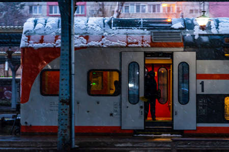 Winter detail train view. Train on the platform of Bucharest North Railway Station (Gara de Nord Bucuresti) in Bucharest, Romania, 2021のeditorial素材