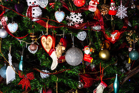 Beautiful Christmas ornaments and decorations hanging in the Christmas tree
