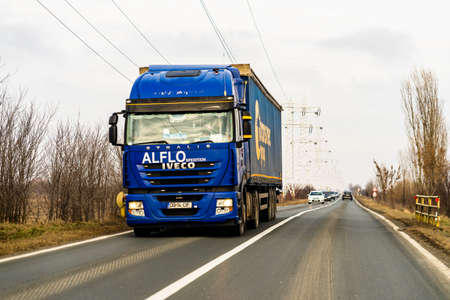 Heavy duty truck in traffic in Bucharest, Romania, 2021のeditorial素材