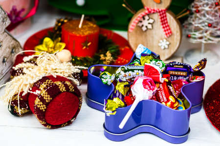 Sweets under Christmas tree. Christmas decorations concept in Bucharest ,Romania, 2022のeditorial素材