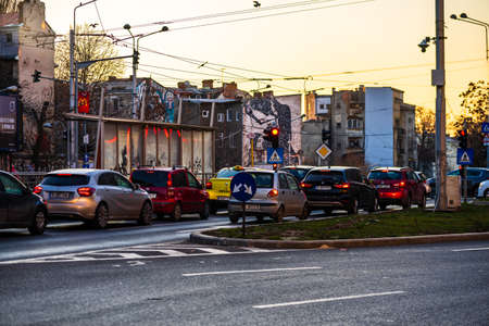 Cars in traffic at rush hour in downtown area of the city. Car pollution, traffic jam in the morning and evening in the capital city of Bucharest, Romania, 2021のeditorial素材