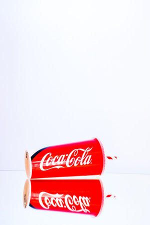 Coca Cola paper cup. Illustrative editorial photo in studio in Bucharest, Romania, 2021のeditorial素材