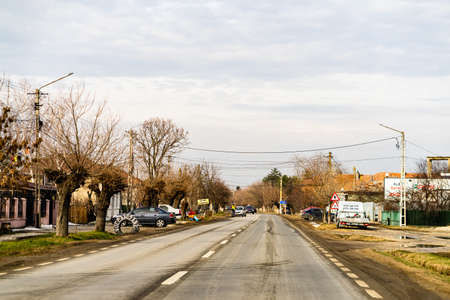 Cars on the road in traffic in Targoviste, Romania, 2021のeditorial素材