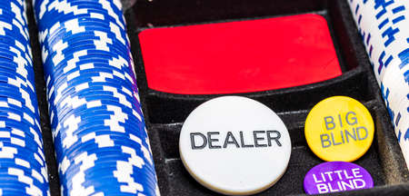Stacks of poker chips detail with cardsの写真素材