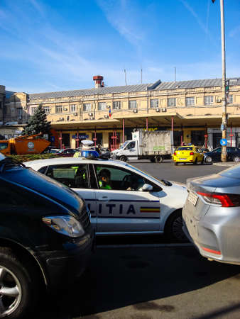 Cars in traffic at rush hour in downtown area of the city. Car pollution, traffic jam in the morning and evening in the capital city of Bucharest, Romania, 2021のeditorial素材