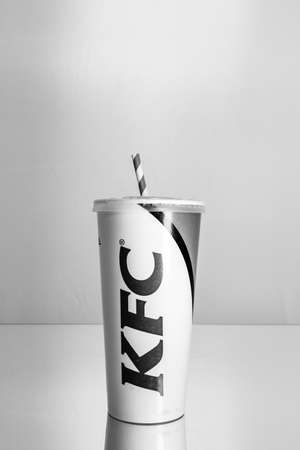 KFC drink in paper cup. Bucharest, Romania, 2021のeditorial素材