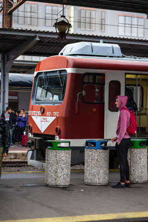 Travelers and commuters waiting for a train on the train platform of Bucharest North Railway Station (Gara de Nord Bucharest) in Bucharest, Romania, 2022のeditorial素材