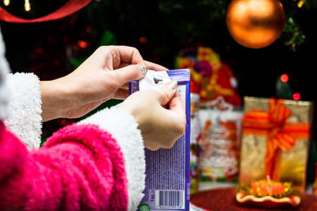Sweets under Christmas tree. Christmas decorations concept in Bucharest ,Romania, 2022のeditorial素材