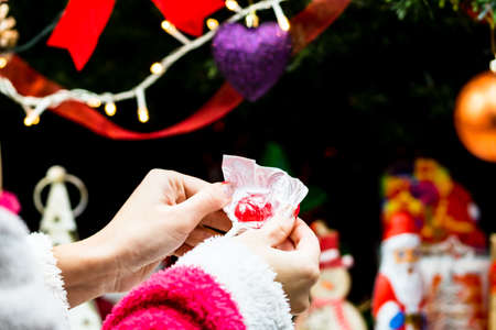 Sweets under Christmas tree. Christmas decorations concept in Bucharest ,Romania, 2022のeditorial素材