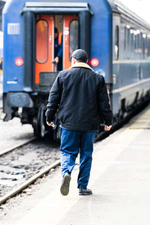 Travelers and commuters waiting for a train on the train platform of Bucharest North Railway Station (Gara de Nord Bucharest) in Bucharest, Romania, 2022のeditorial素材