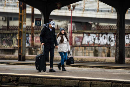 Travelers and commuters waiting for a train on the train platform of Bucharest North Railway Station (Gara de Nord Bucharest) in Bucharest, Romania, 2022のeditorial素材
