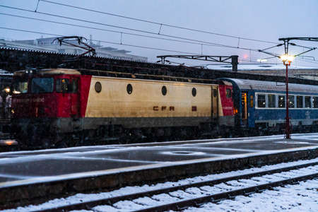 Winter detail train view. Train on the platform of Bucharest North Railway Station (Gara de Nord Bucuresti) in Bucharest, Romania, 2021のeditorial素材
