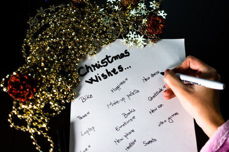 Making a list with goals or shopping list on white paperの写真素材