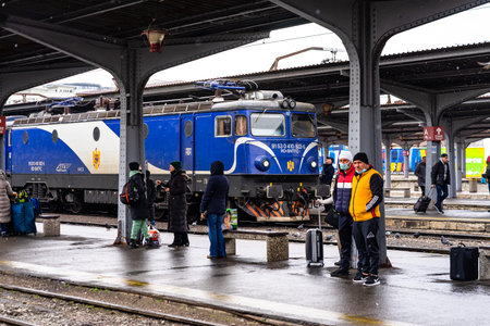 Bucharest, Romania, 2022. War refugees at Bucharest Railway Station (Gara de Nord). Refugees are...