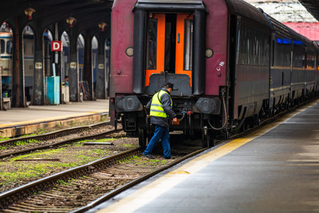 Train in motion or at train platform at Bucharest North Railway Station (Gara de Nord Bucharest) in...