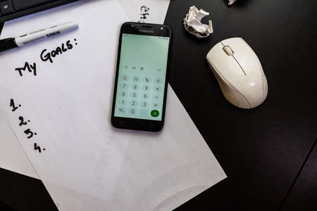 Detail of pc mouse, coffee and keyboard in Bucharest, Romania, 2021のeditorial素材