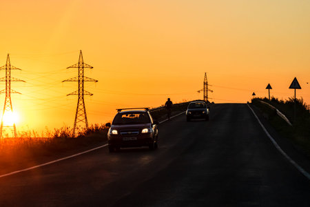 Car traffic at rush hour. Traffic jam, cars on the road at sunset in Bucharest, Romania, 2021